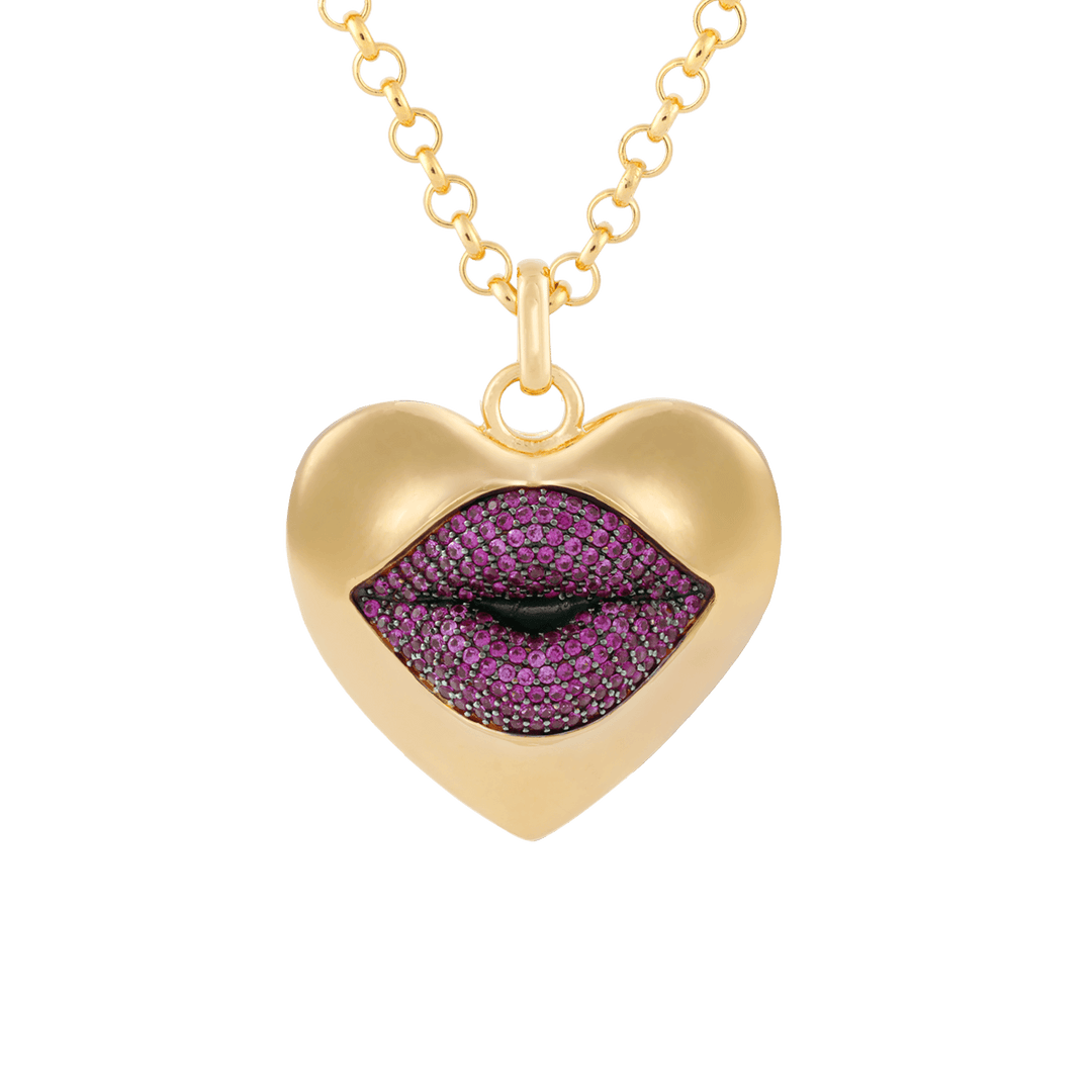 Gold necklace with a heart-shaped pendant featuring  red lips